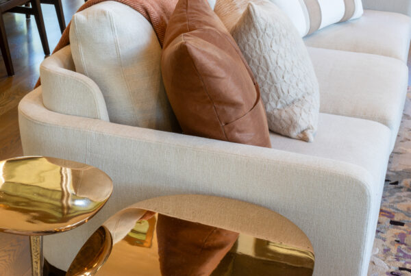 Sofa with gold side tables